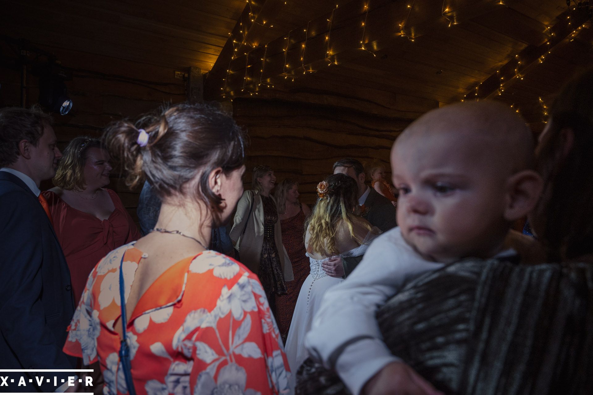 Guests look on at as the couple have their first dance