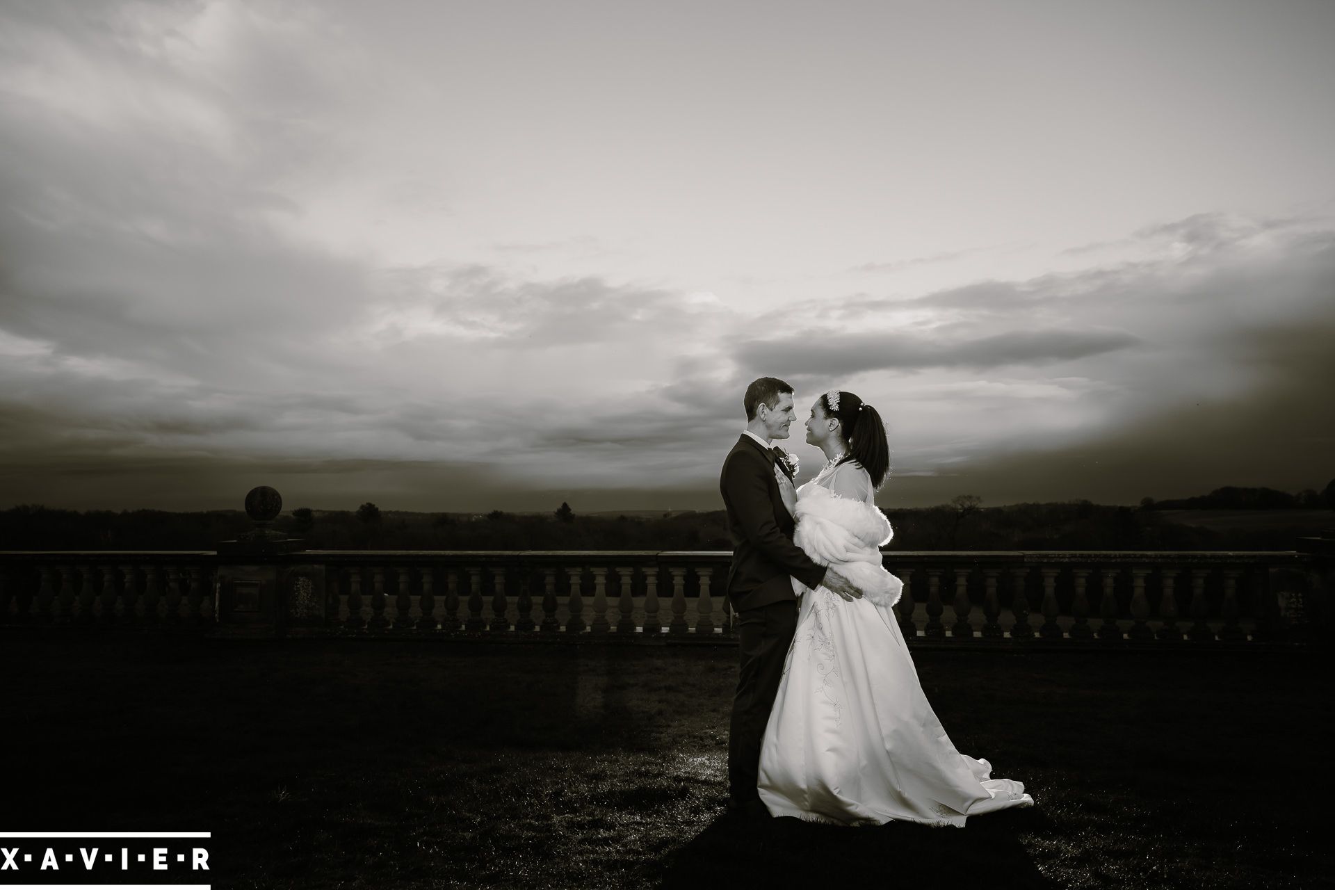 bride and groom outside at sunset