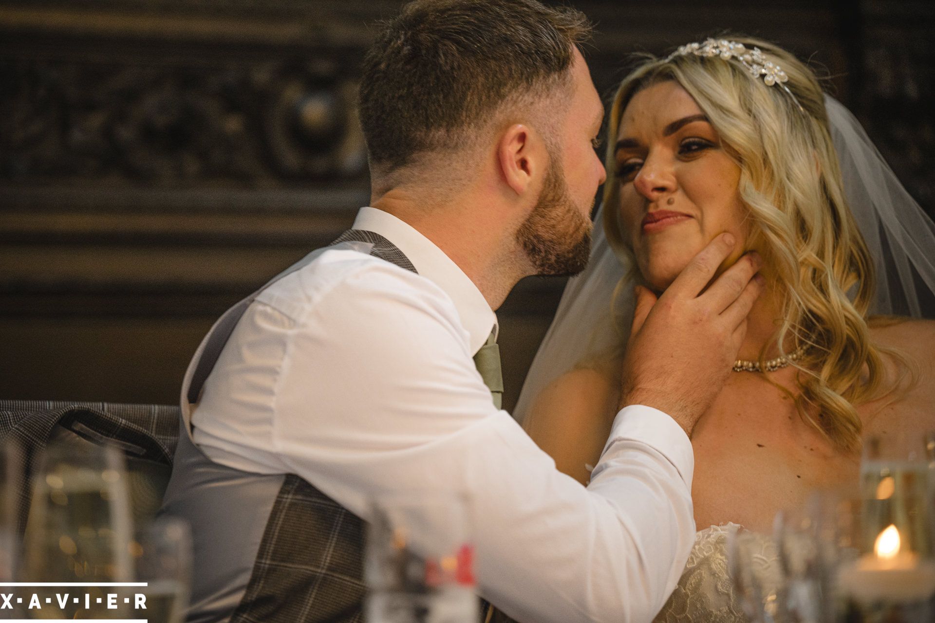 bride and groom look lovingly at each other