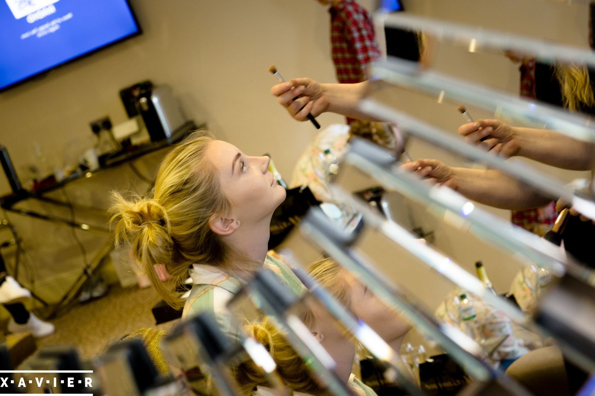 bride having her make up on