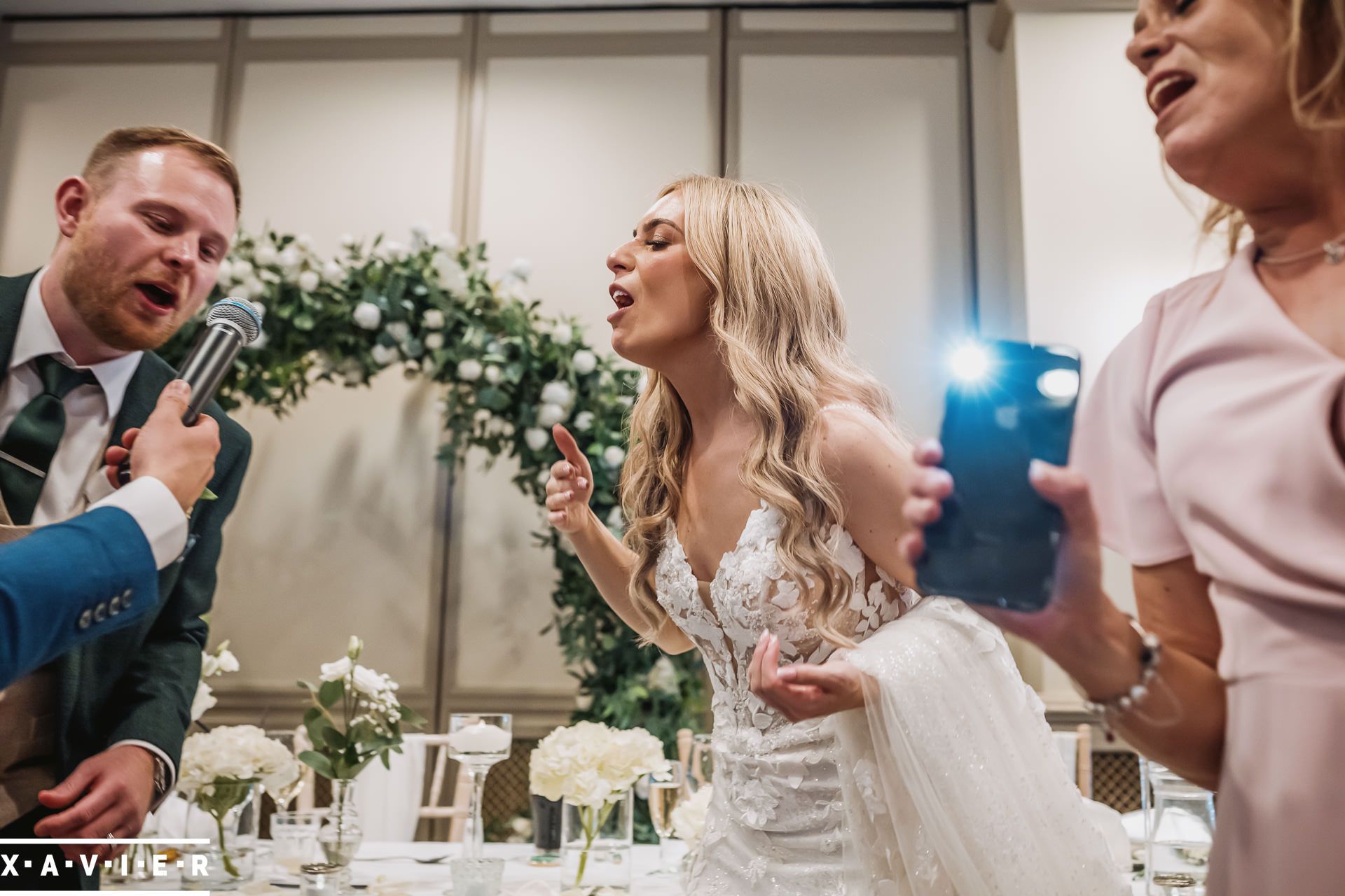 bride and groom singing at oulton hall