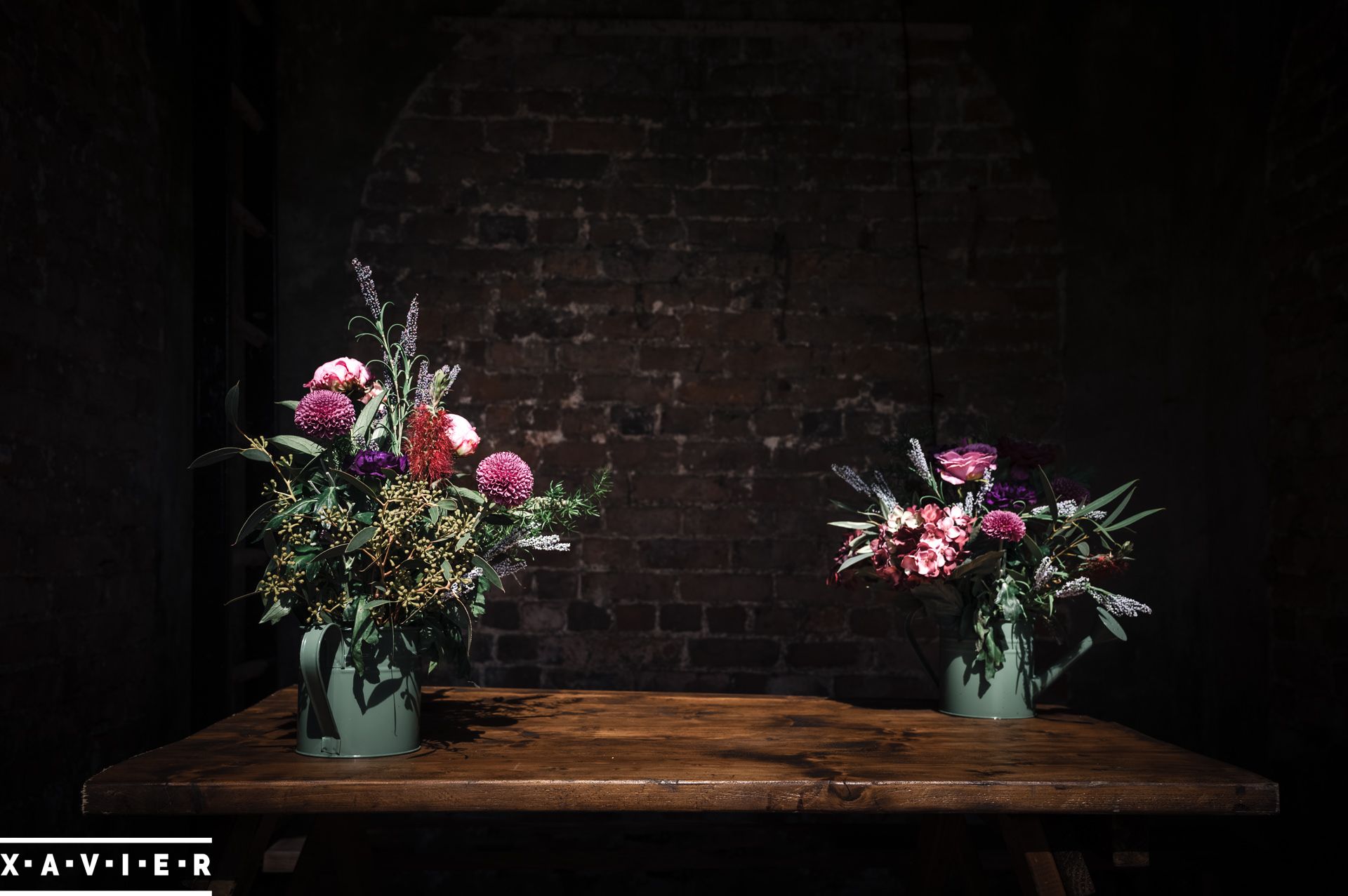 two jugs of wedding flowers