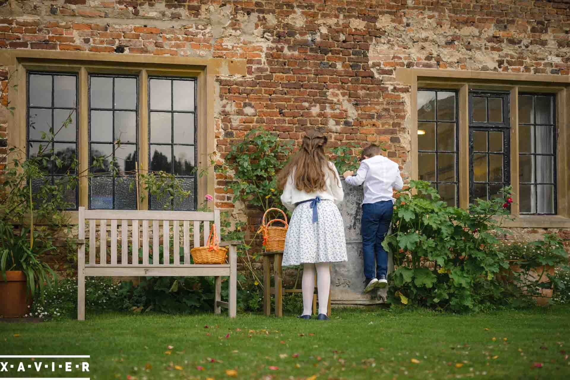 guests investigating the wedding venues courtyard