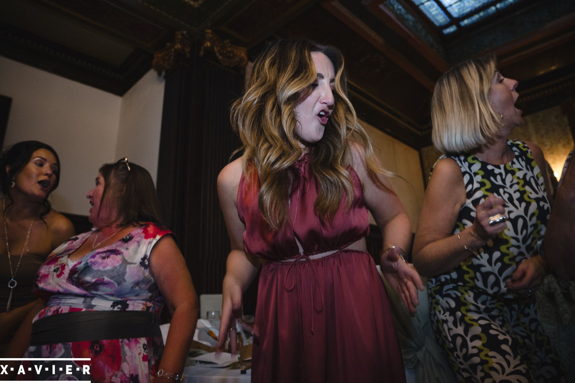 Guests dancing to the singing waiter