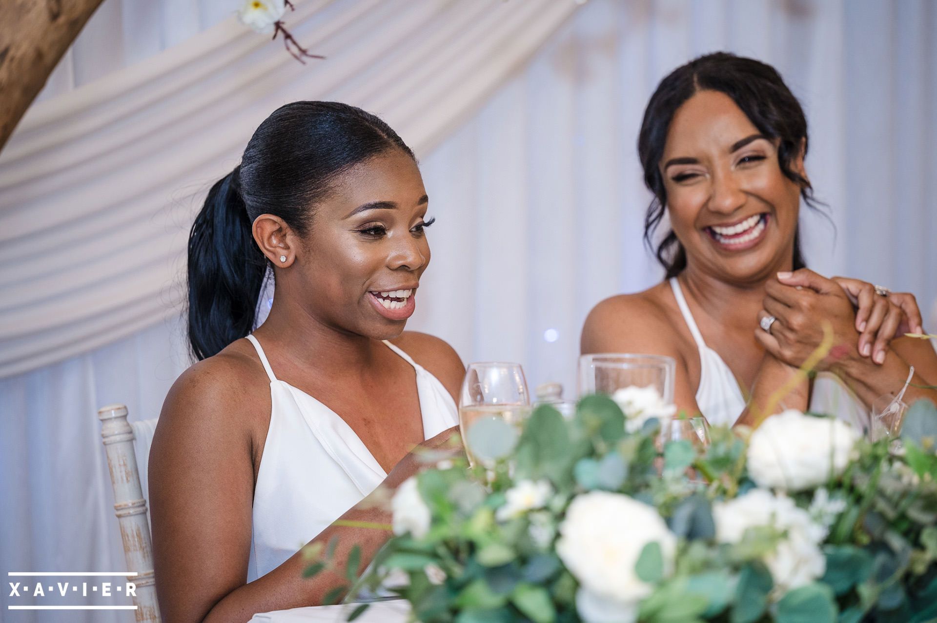 Bridesmaids giggling