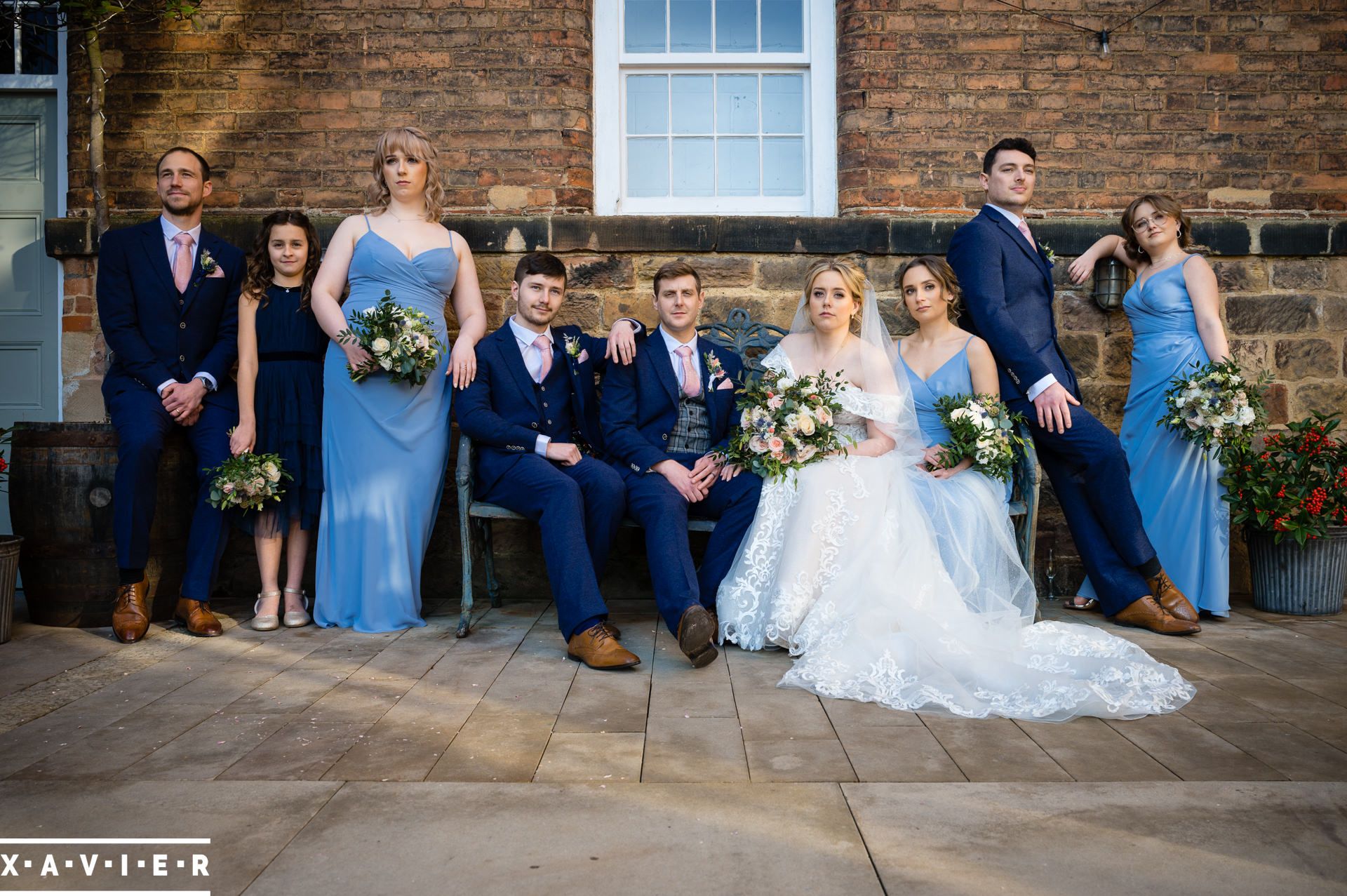 the bridal party pose for a photo