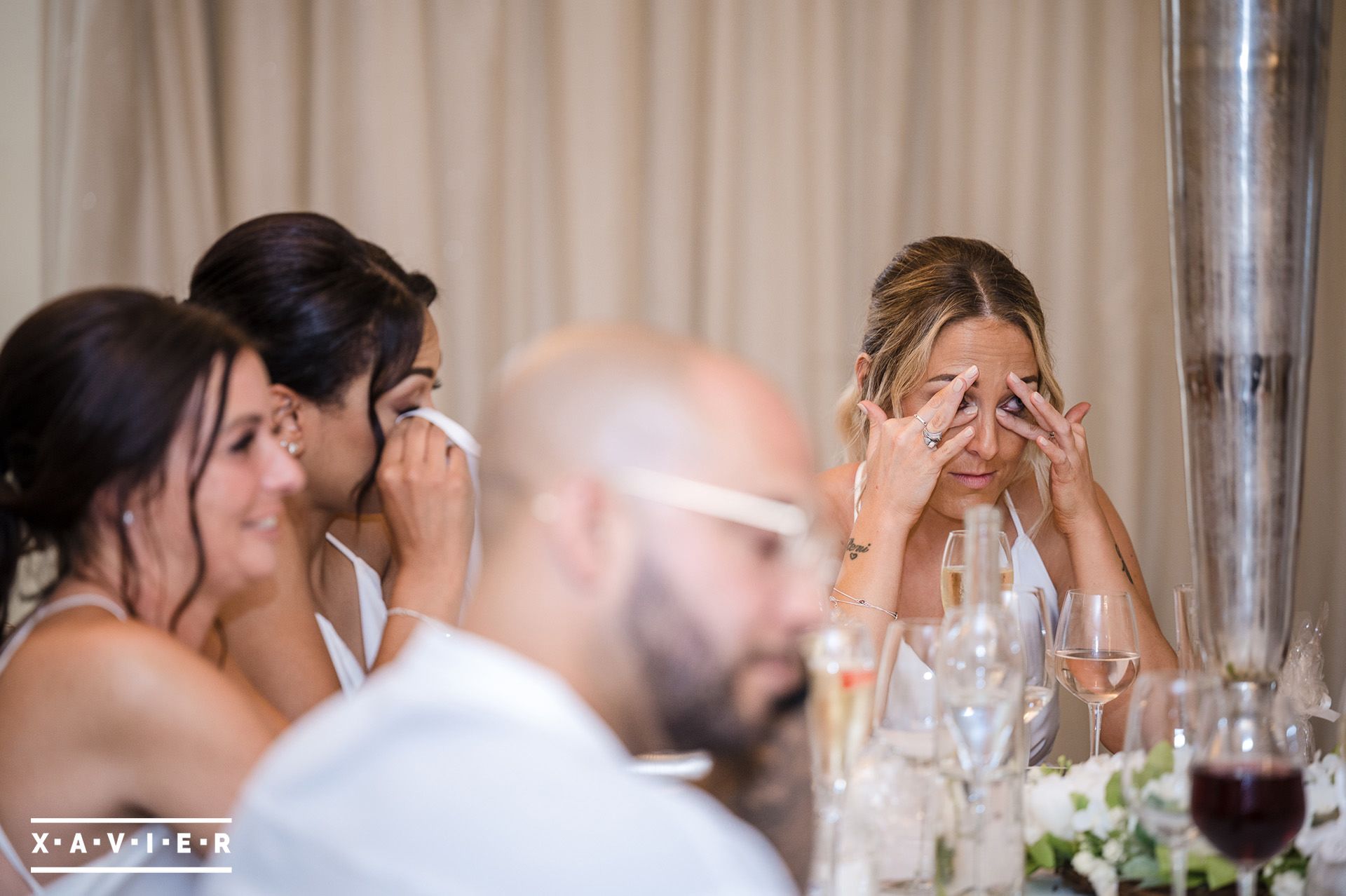 Bridesmaids are emotional during the speeches