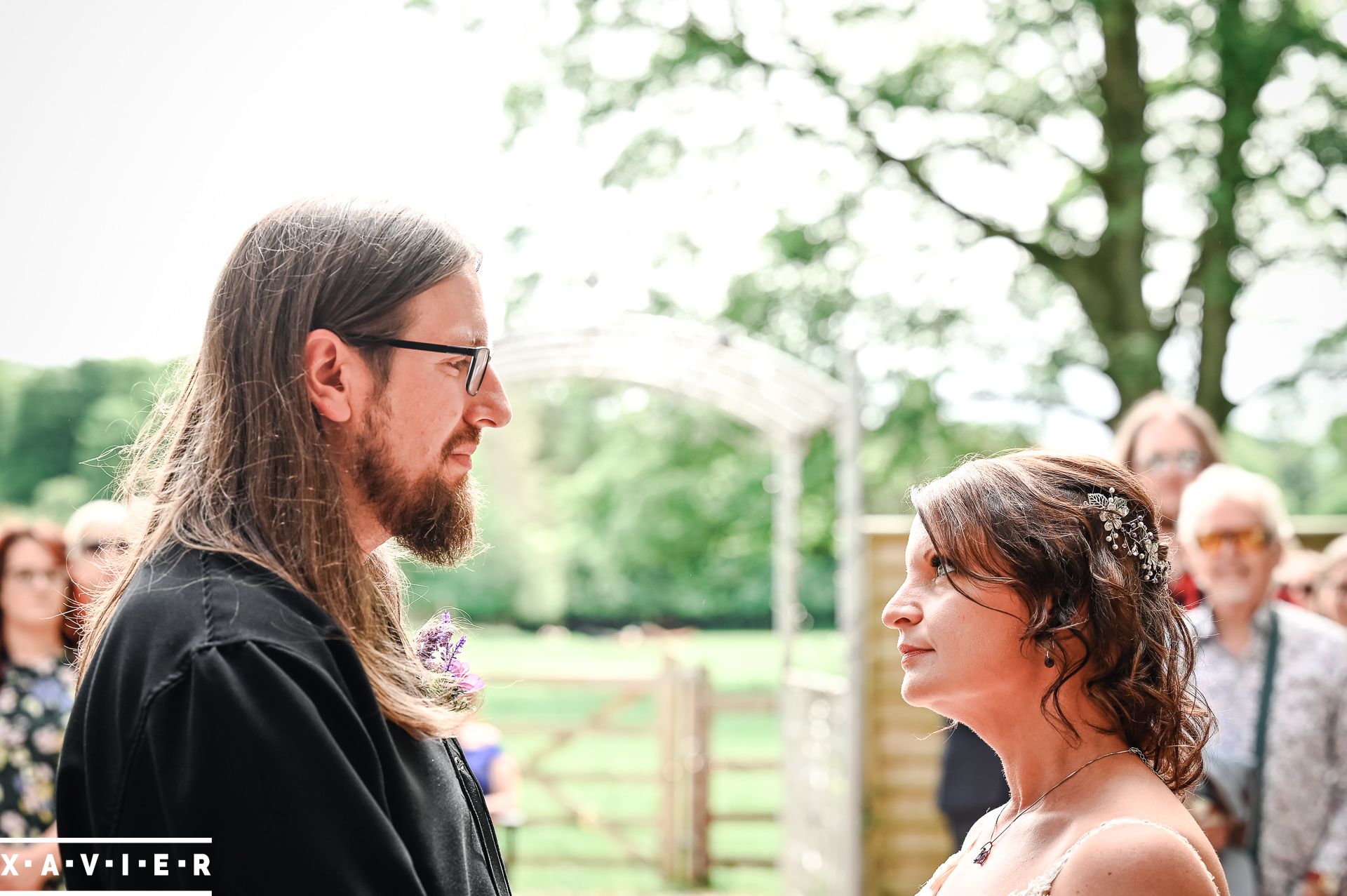 bride an dgroom facing each other at the ceremony