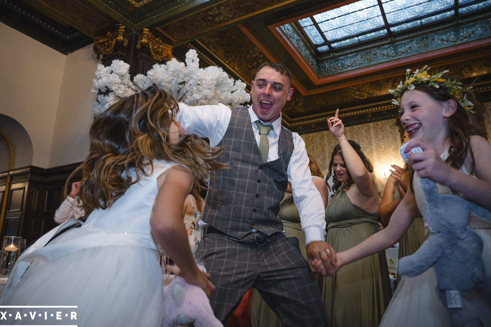 Bridal party dancing