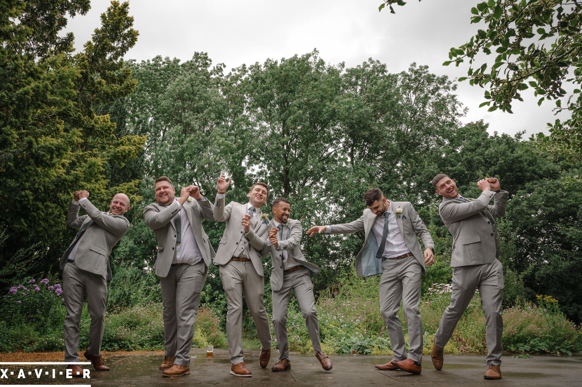 groomsmen pretending to play golf