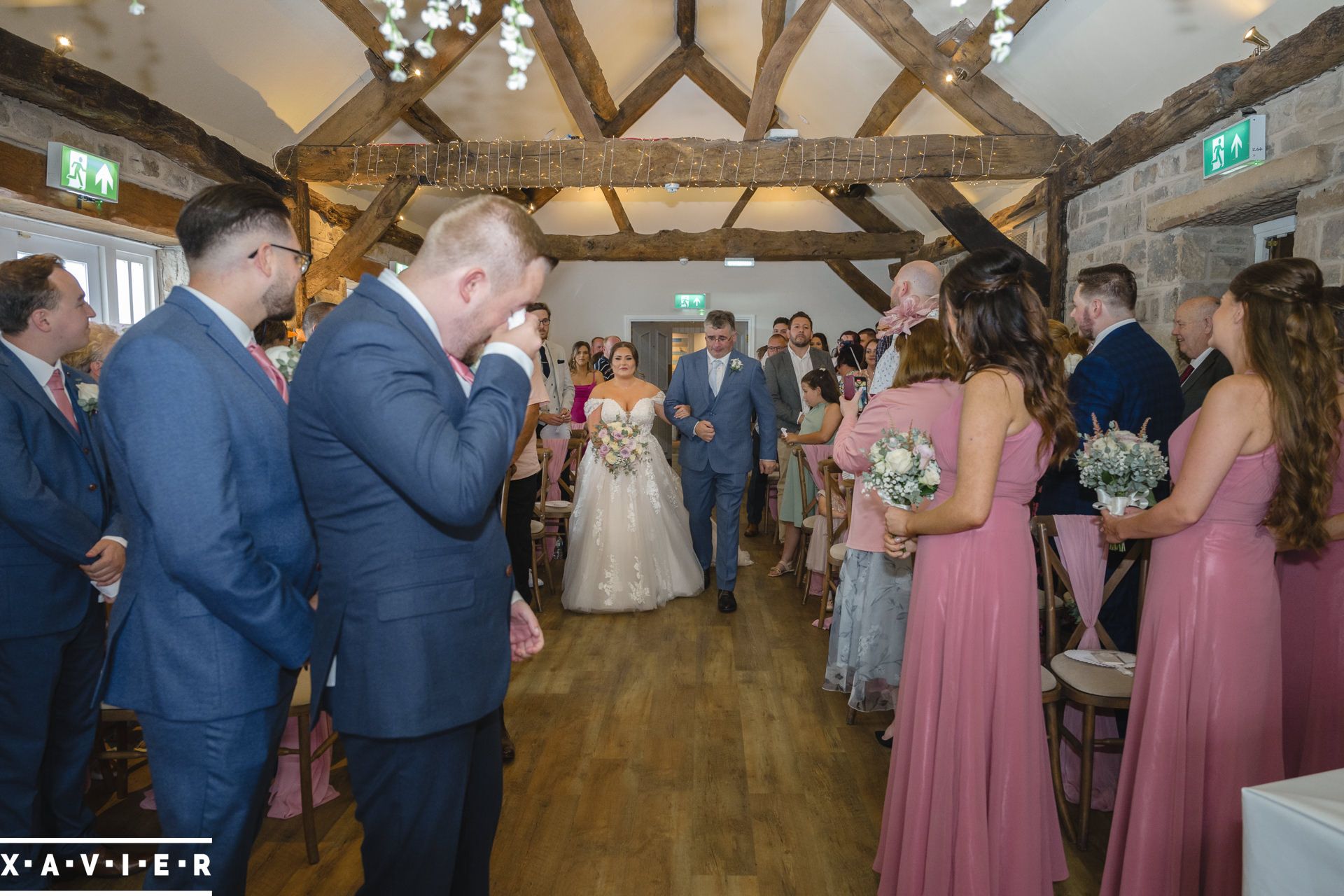 bride is led down the aisle at Tankersley Manor Hotel, Barnsley