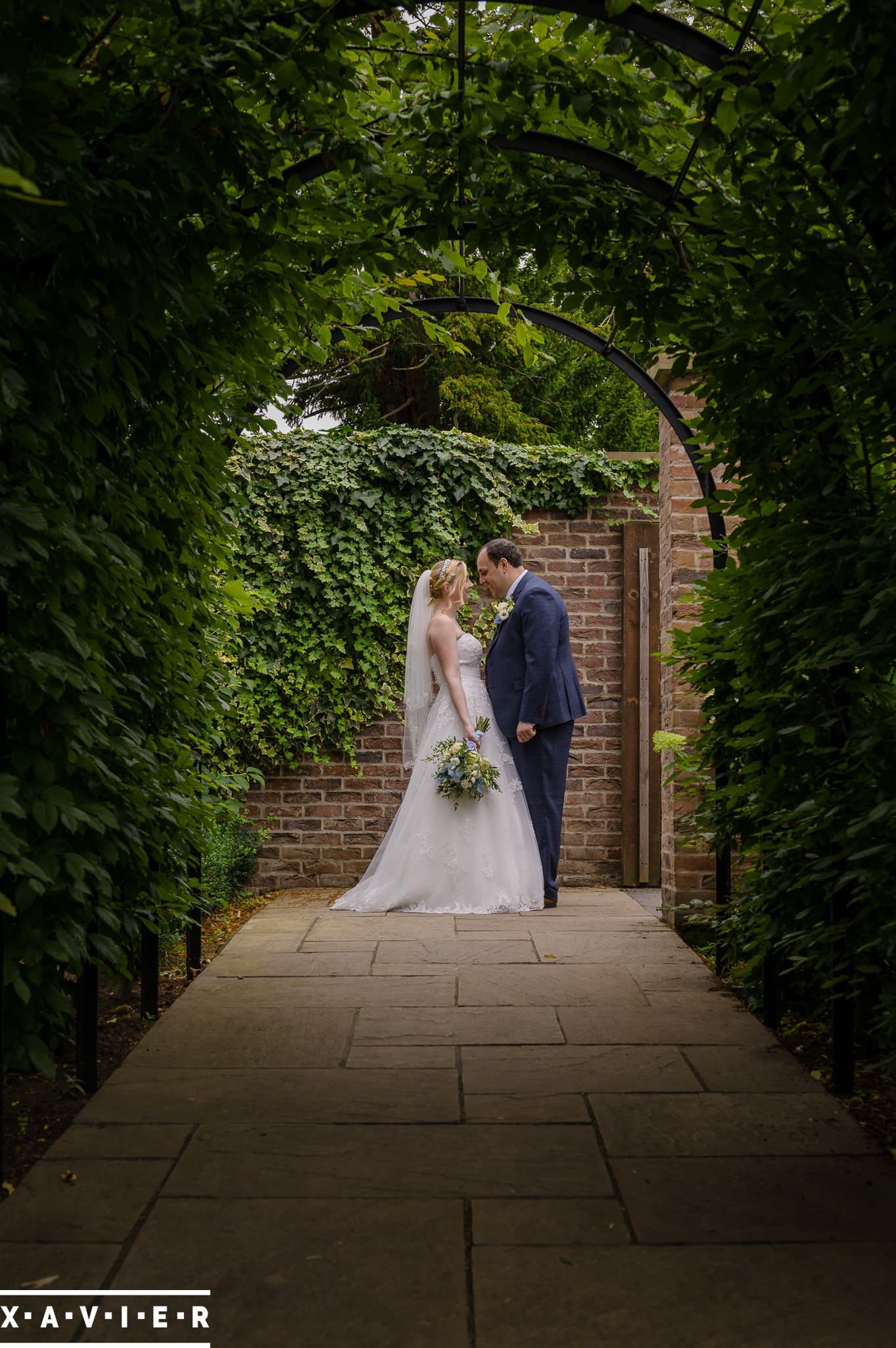 bride and groom are looking at each other