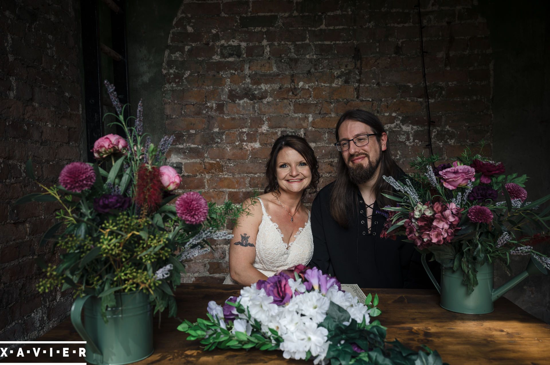 bride and groom pose for wedding photos