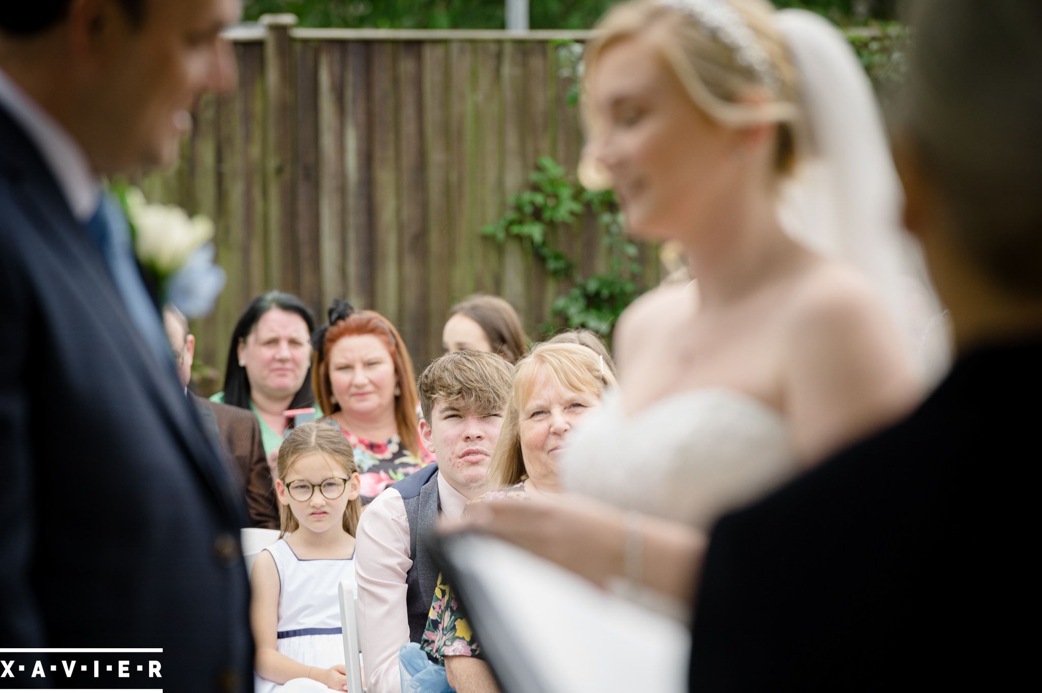 guests watch the bride and groom