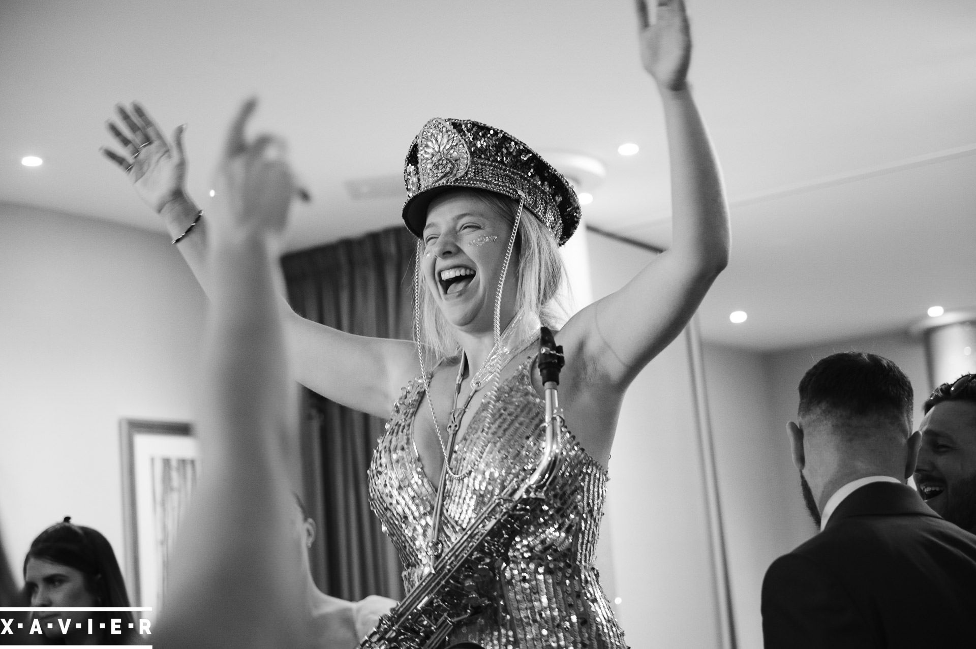 Wedding dancing with the saxophonist