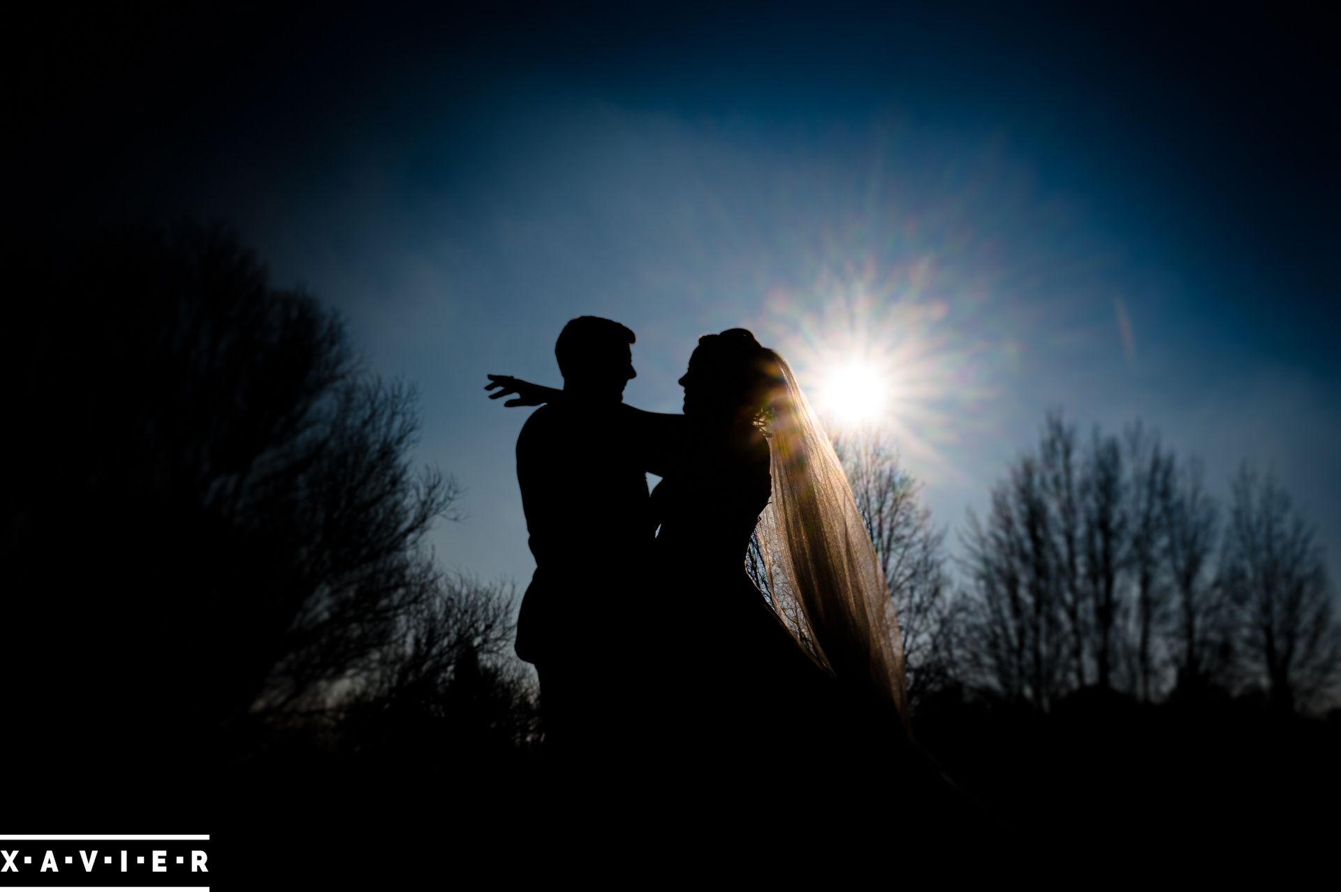 Silhouette of bride and groom