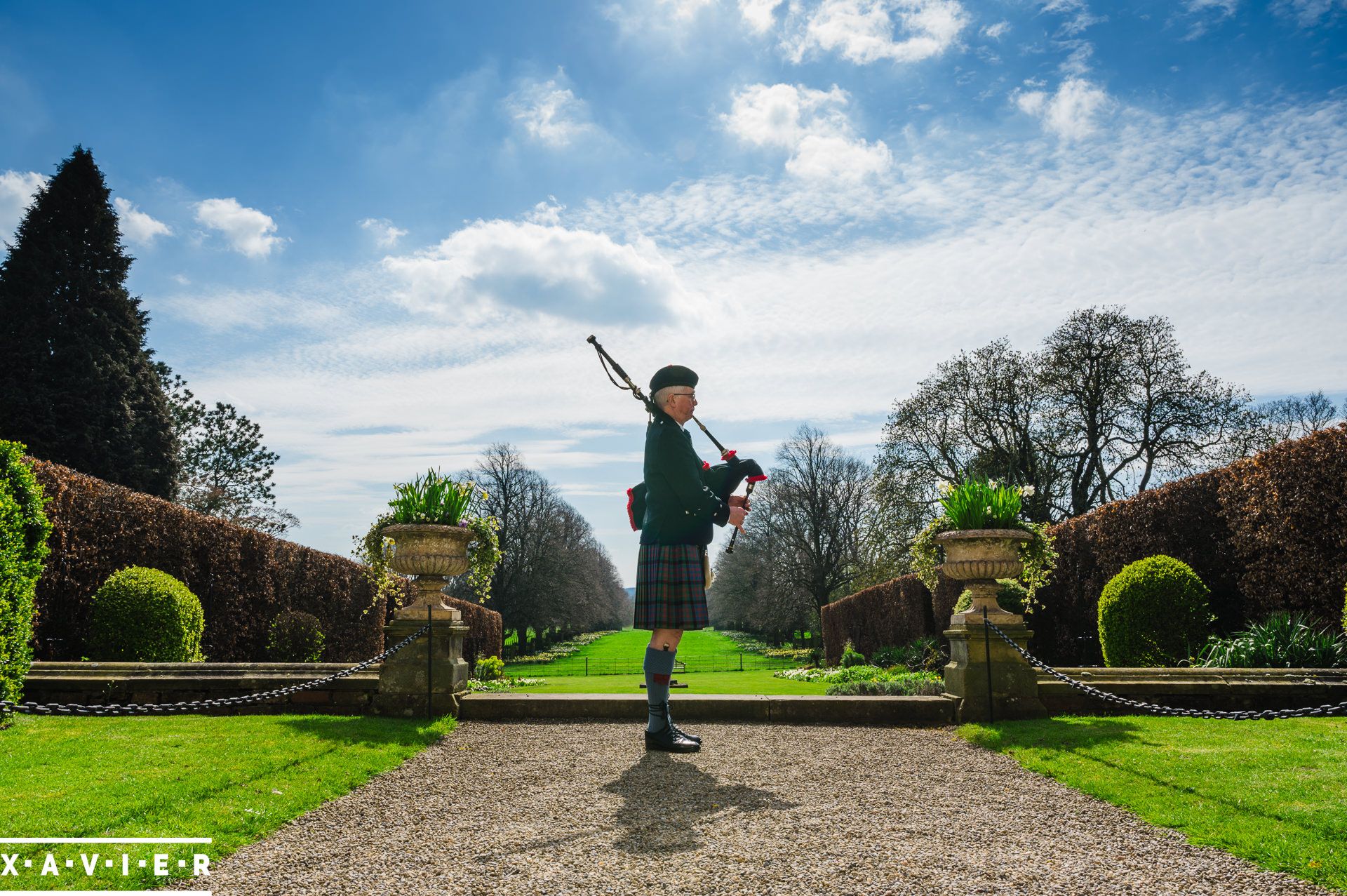 Man in kilt playing bagpipes