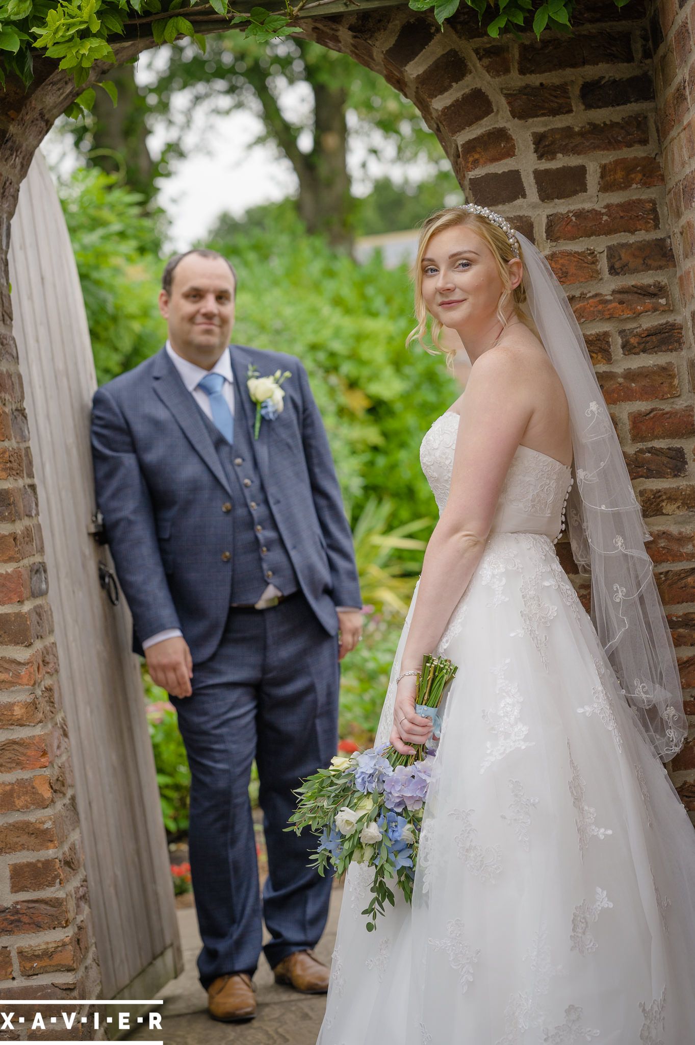 groom admires the bride