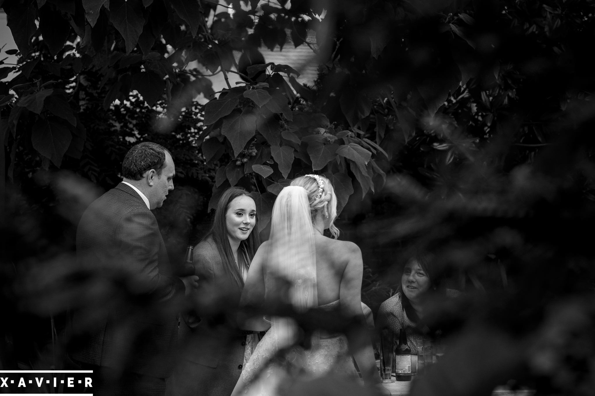 bride and groom chat to guests