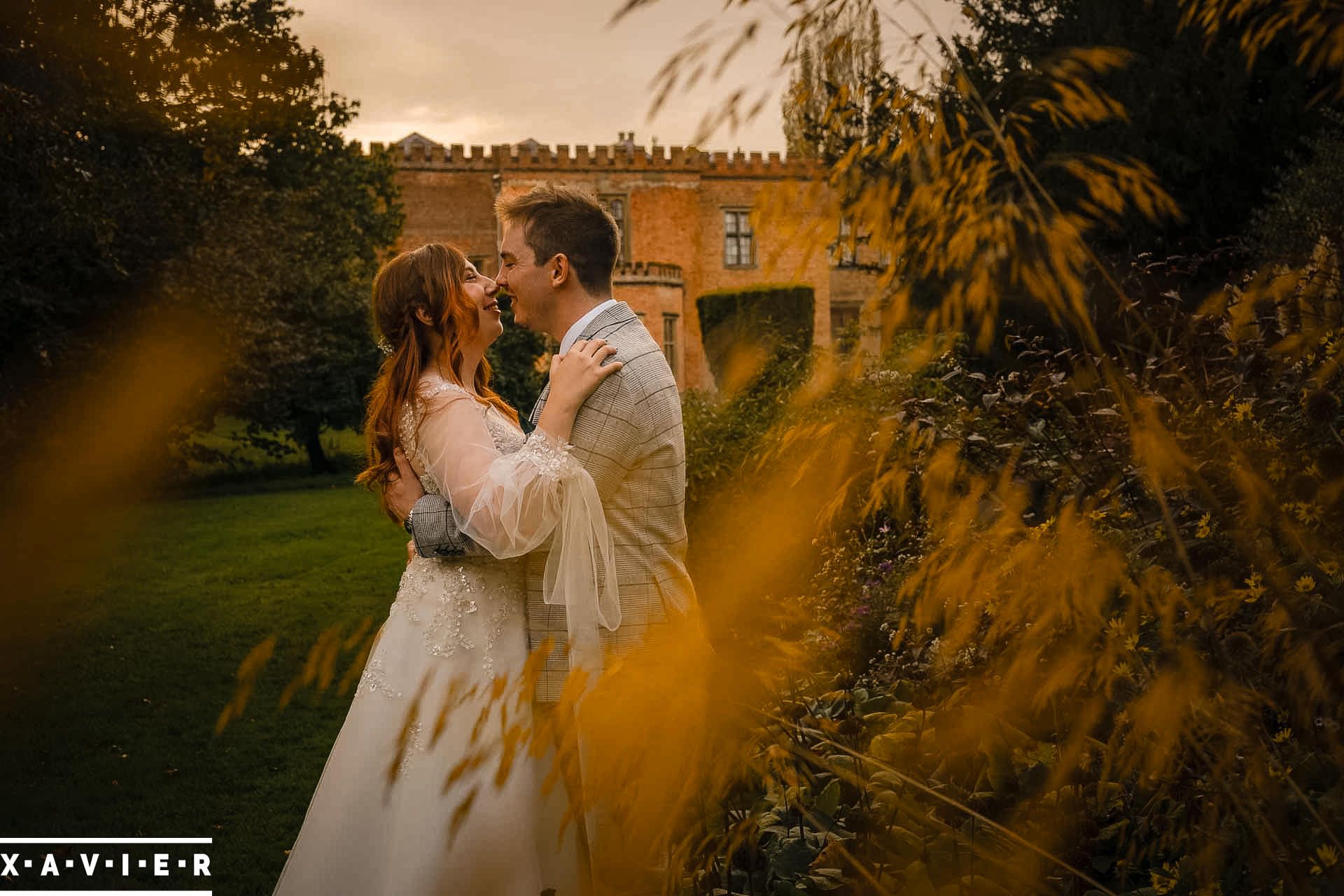 bride and groom look into each others eyes