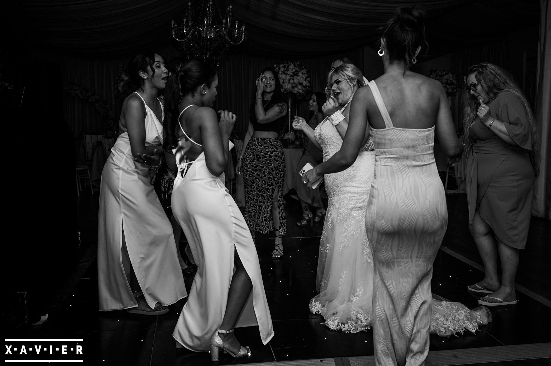 Bride dances with bridesmaids