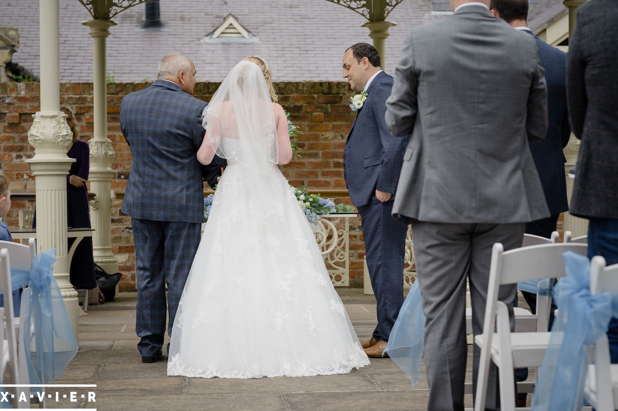 groom looks at bride